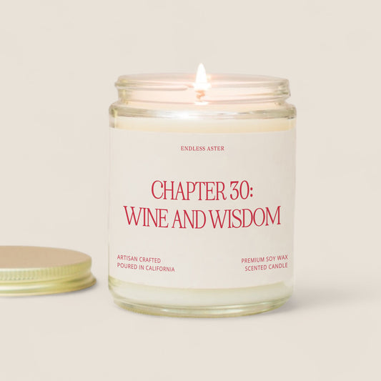 a candle sitting next to a jar of wine